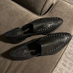 Black Free People 
* Silver Studded slip-on leather shoe
* 1” heel